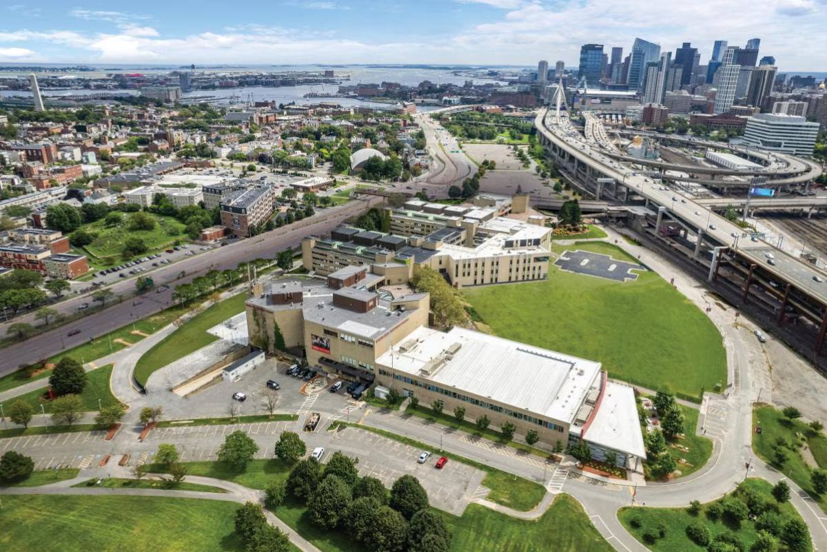 Aerial view of Bunker Hill Community College campus with the Boston skyline behind it